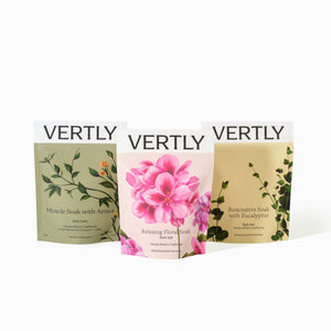 Three packages of Vertly soaks with floral and botanical designs on a white background