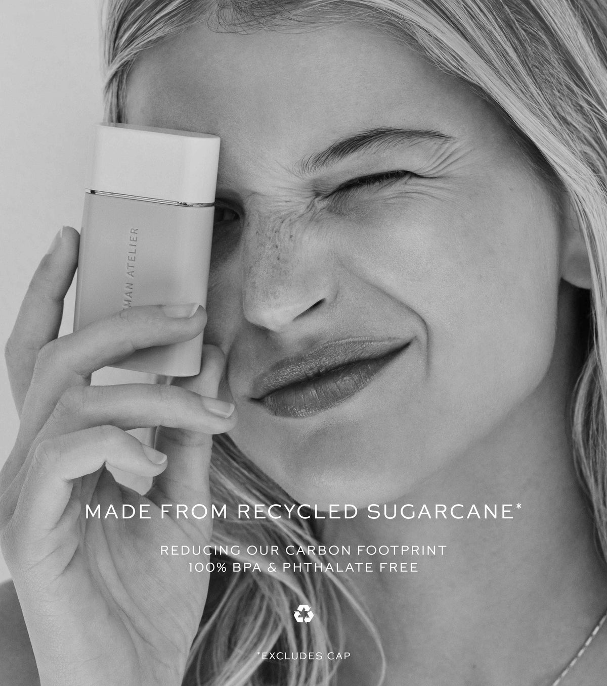 Woman holding a skincare product with text about recycled sugarcane and sustainability.