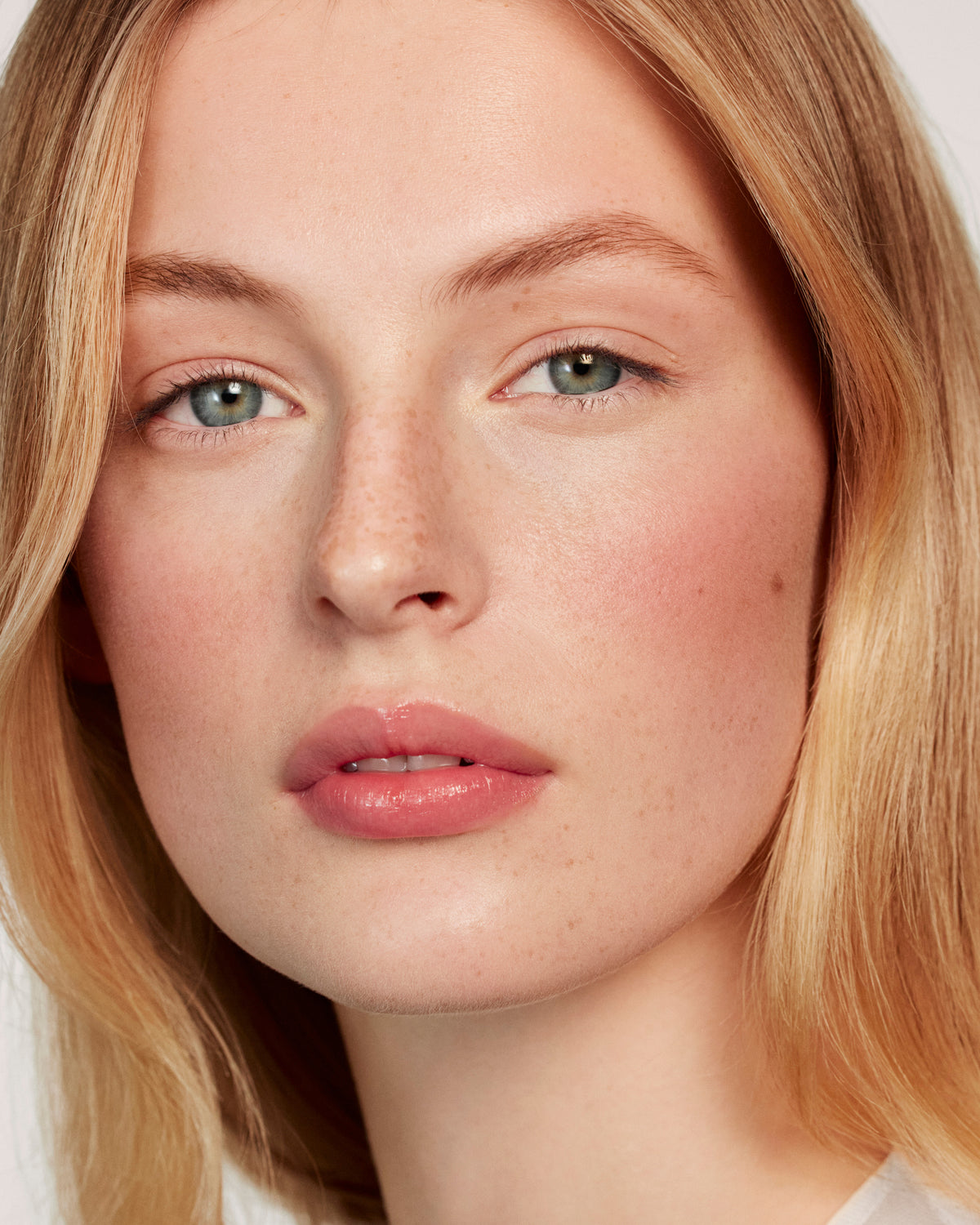 A Westman Atelier cheek powder duo featuring a deeper shade on one side and a lighter shade on the other, both with a matte finish.