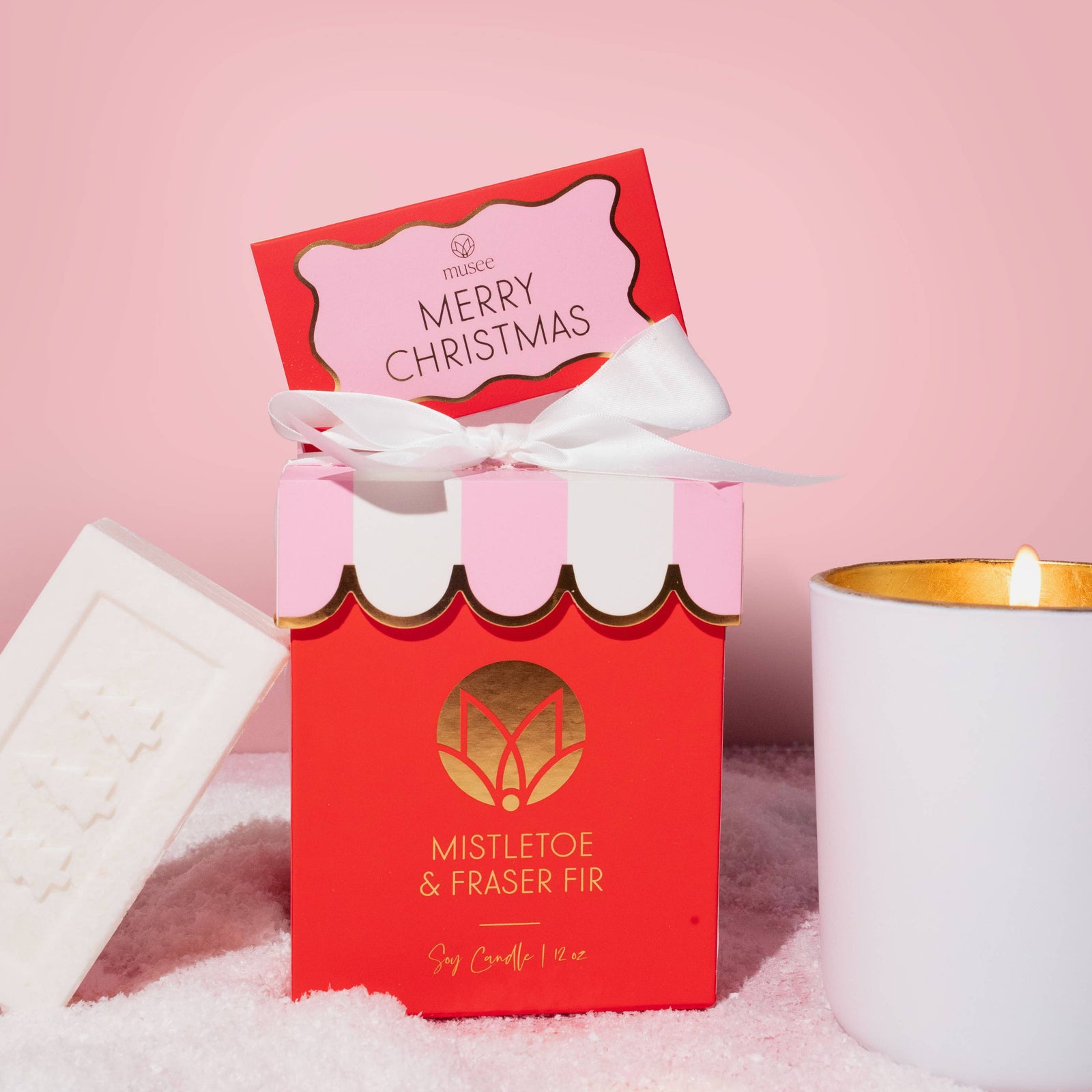 Merry Christmas card with red border and pink center on a white background