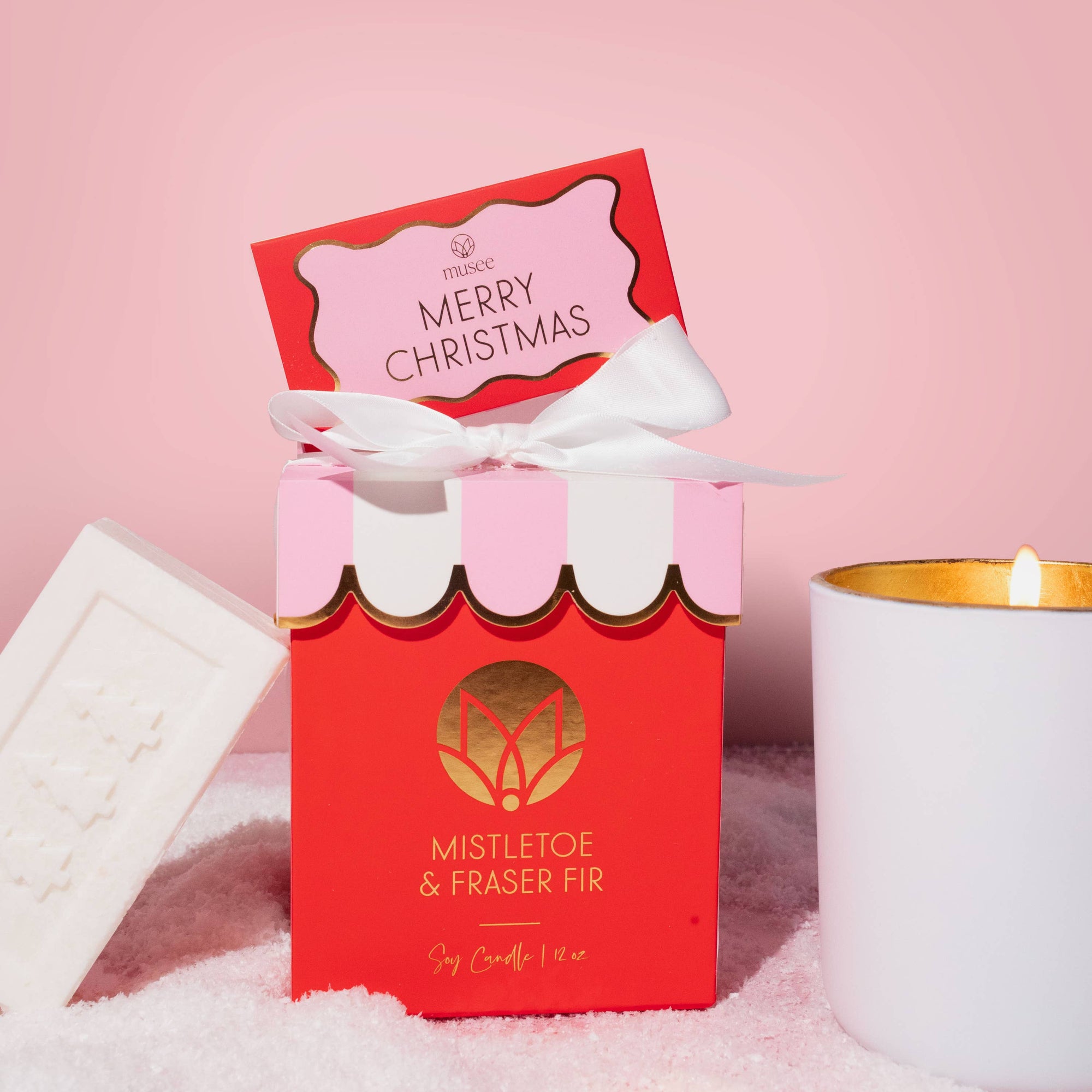 Merry Christmas card with red border and pink center on a white background