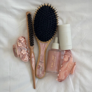 The Emijay pink Flatbush, along with Halo hair oil and a sweetheart clip