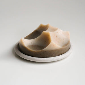 An ume studios erode soap on a marble bouton. 