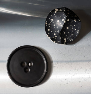 An ume studios erode soap on a marble bouton. 