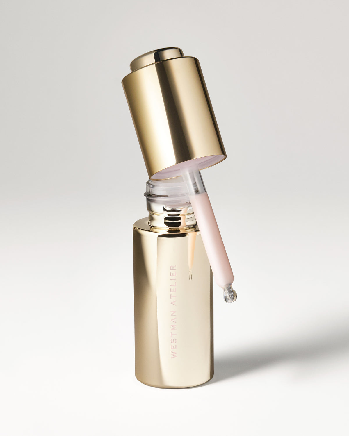 A gold bottle of Westman Atelier Eye Activator Serum
