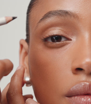 Two eye pencils from Westman Atelier, one sharpened, one not, against a white background with the brand name visible on each pencil.