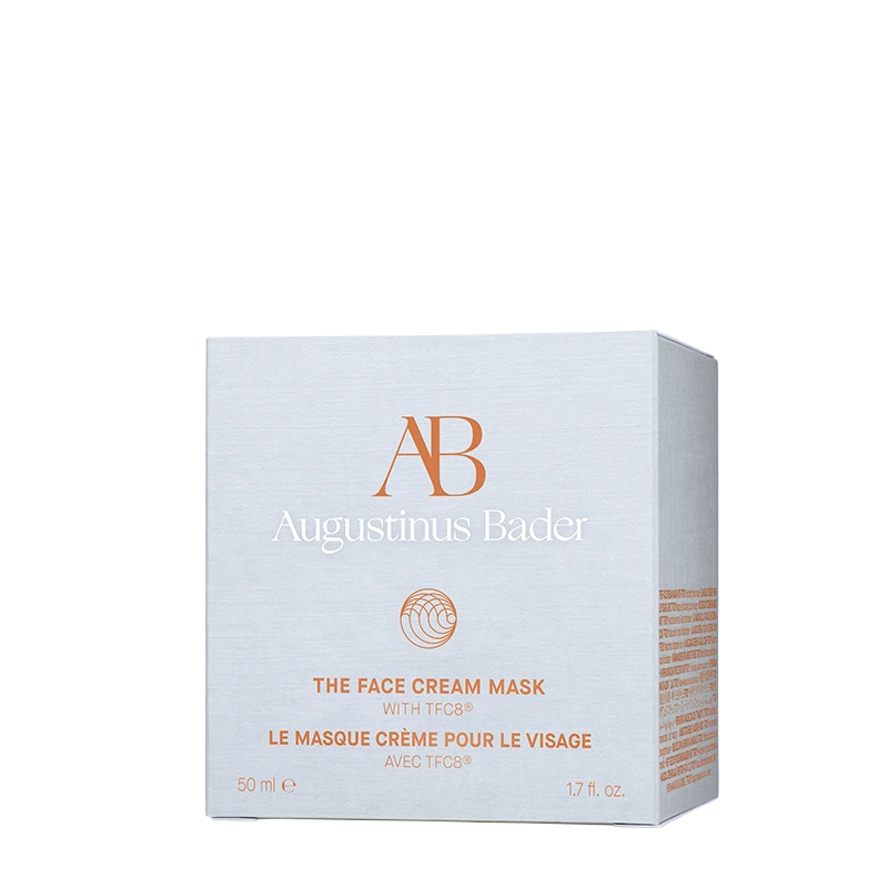 A white box of The Face Cream Mask with orange text