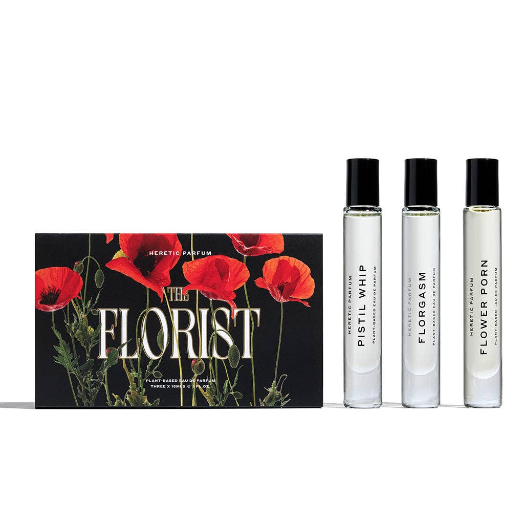 Set of three perfume bottles with a box featuring red flowers and 'The Florist' branding.