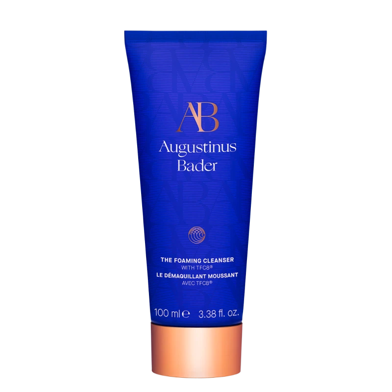 Blue tube of Augustinus Bader foaming cleanser on a white background