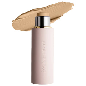 Cosmetic stick with beige color swatch on a white background, featuring the brand 'Westman Atelier'.