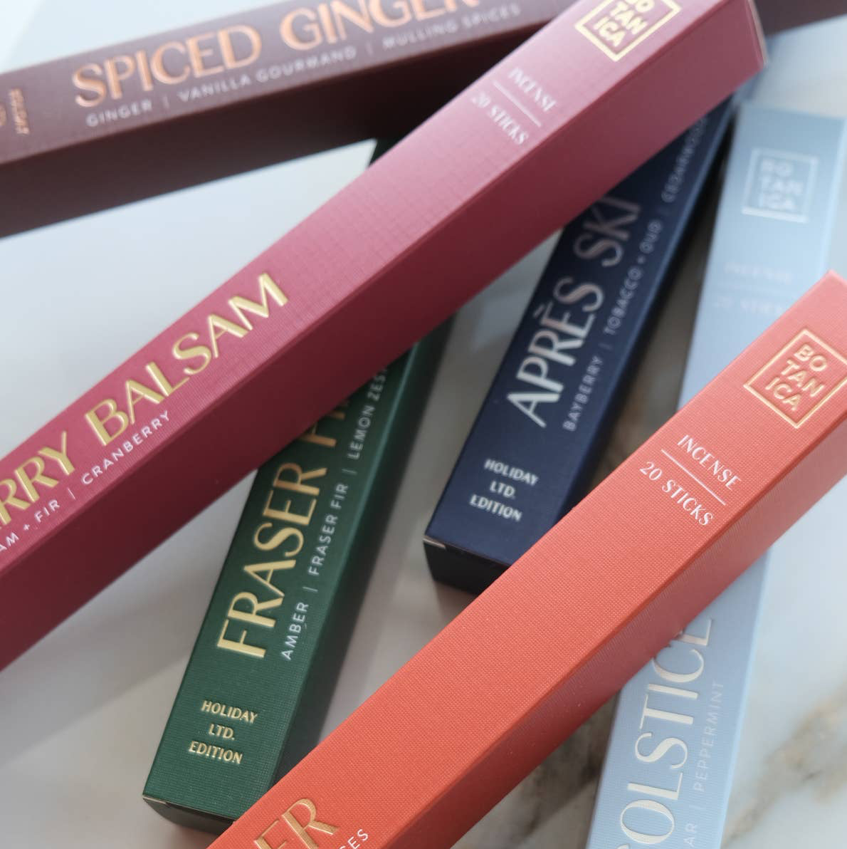 Assorted boxes of different flavors on a marble surface