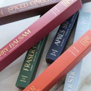 Assorted boxes of different flavors on a marble surface