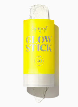 Yellow glow stick with 'supergoop!' branding on a white background