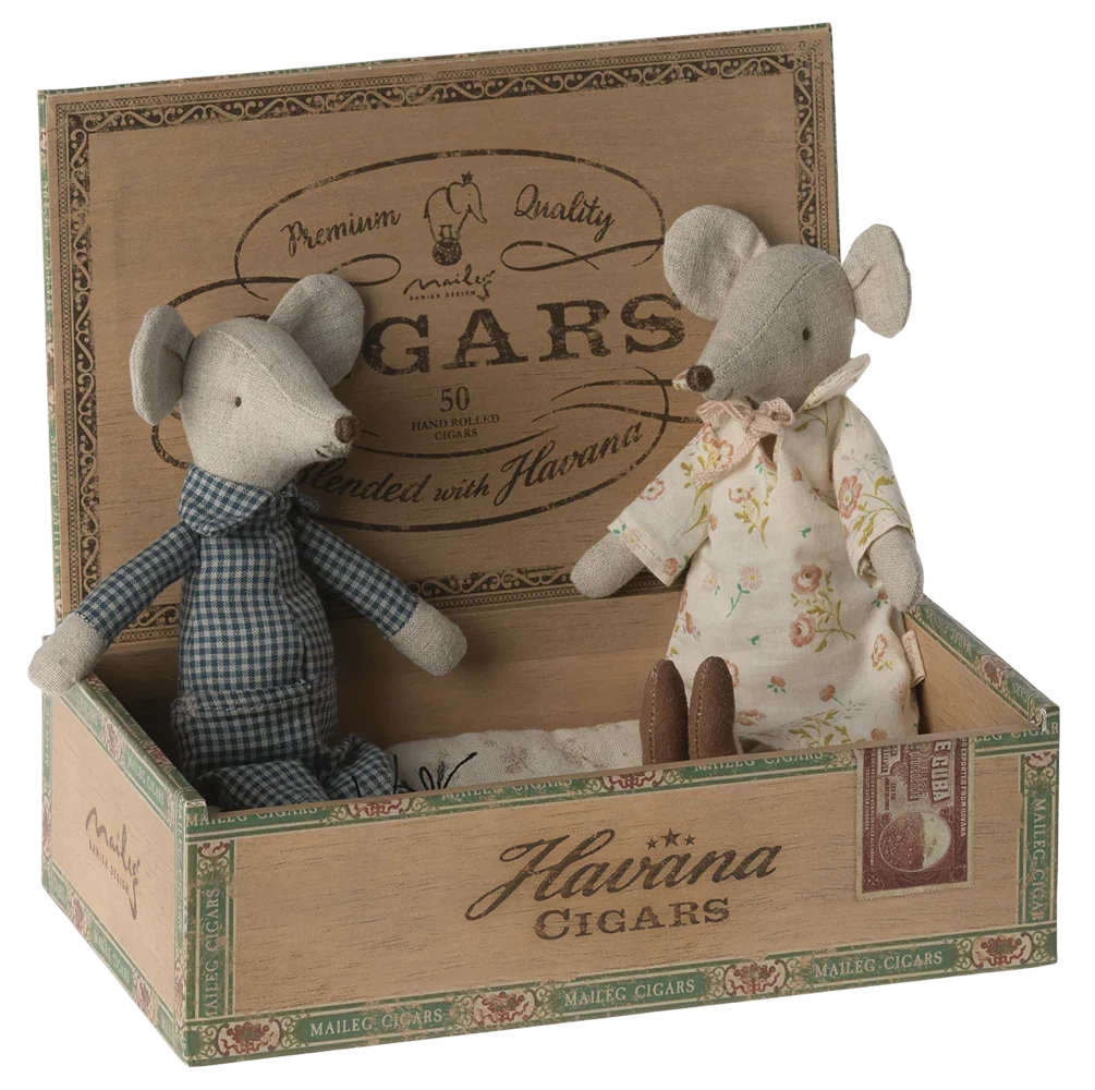 Two toy mice in a decorative cigar box with 'Havana Cigars' branding.
