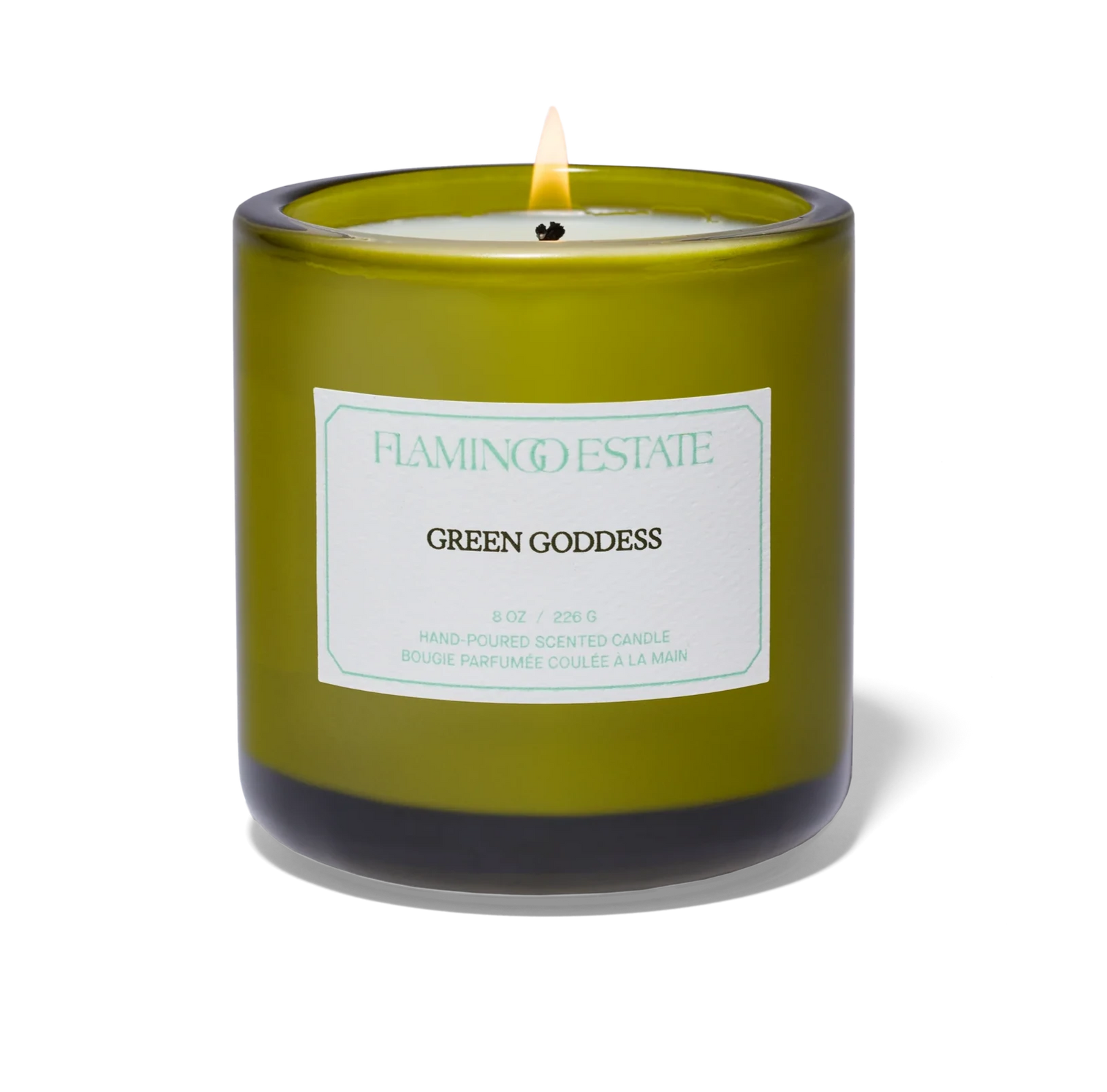 Green candle labeled 'Green Goddess' from Flamingo Estate on a white background