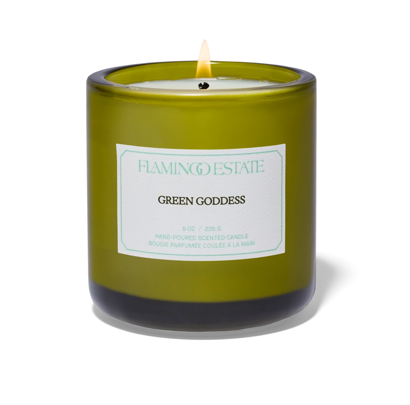 Green candle labeled 'Green Goddess' from Flamingo Estate on a white background