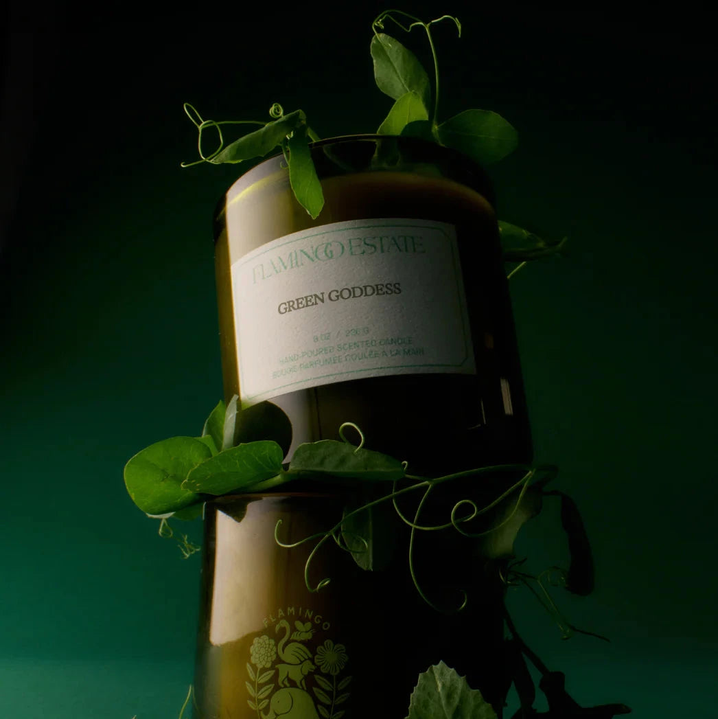 Green candle labeled 'Green Goddess' from Flamingo Estate on a white background
