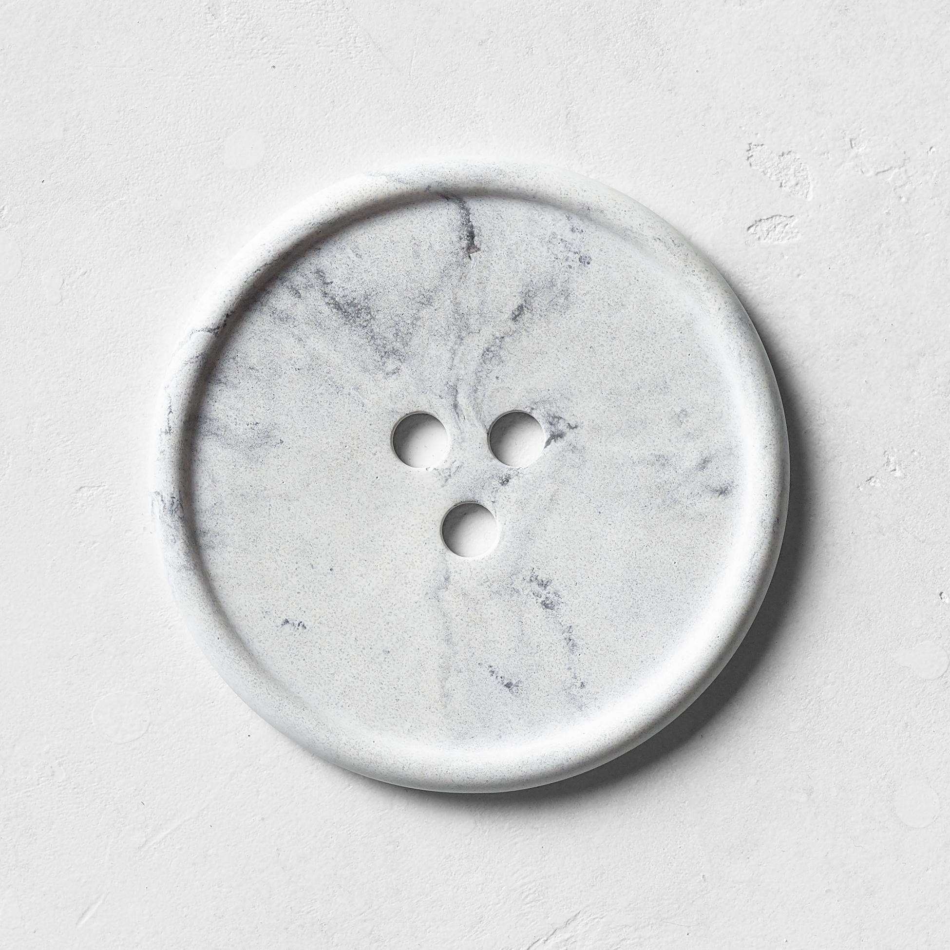 A grey marble bouton. 