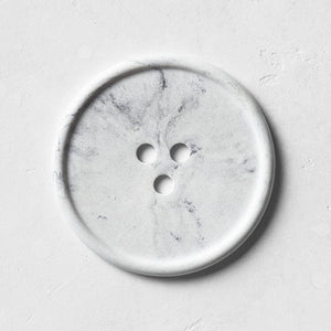 A grey marble bouton. 