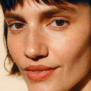 Close-up of a person's face with a neutral expression