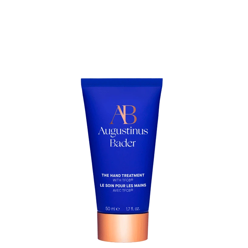 Blue tube of Augustinus Bader hand treatment on a white background