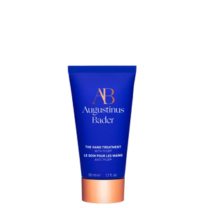 Blue tube of Augustinus Bader hand treatment on a white background