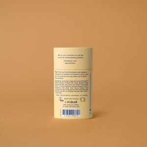 The ingredient label of a hibar deodorant tube, on an orange background. 