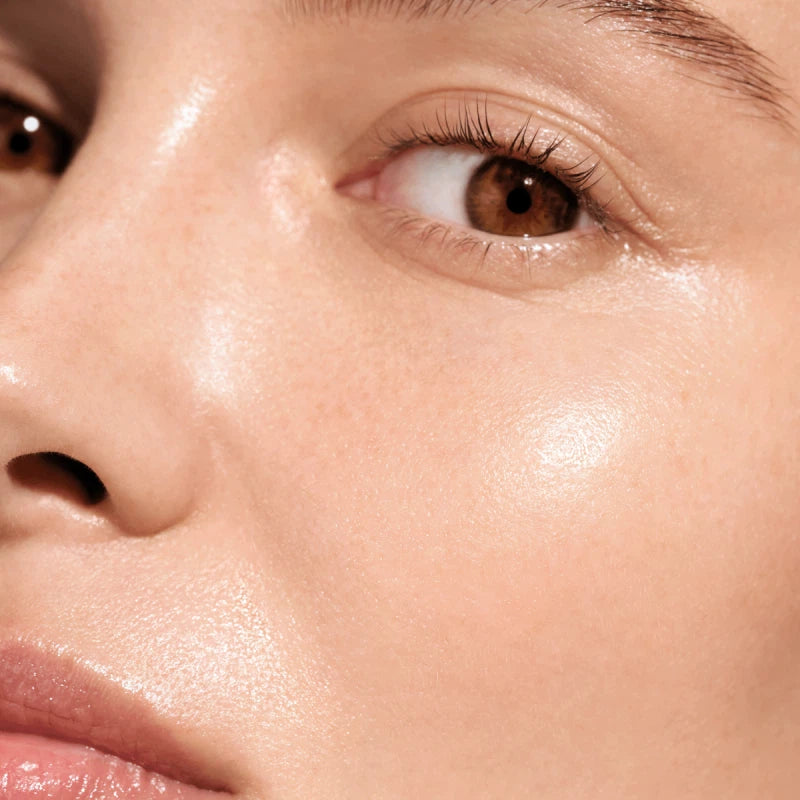 Close-up of a person's eye with a soft focus on skin texture