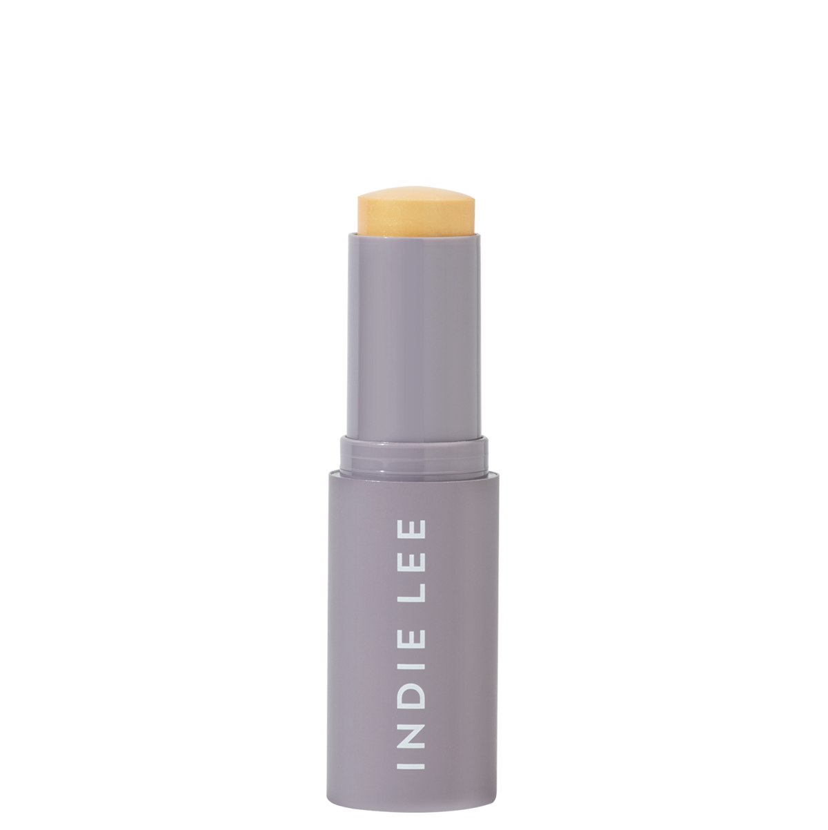 Cosmetic stick with beige cap and gray body on a white background, featuring 'Indie Lee' branding.