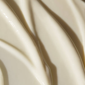 Close-up of smooth, glossy cream color surface.