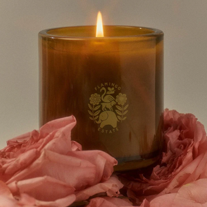 The Flamingo Estate night blooming jasmine and damask rose candle, in a green glass vessel