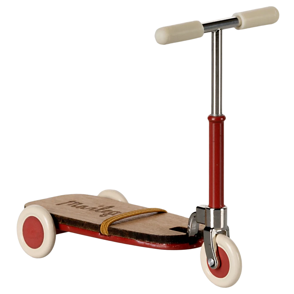 A red and beige Maileg kick board with metal handlebars and wooden details, designed for toy mice.