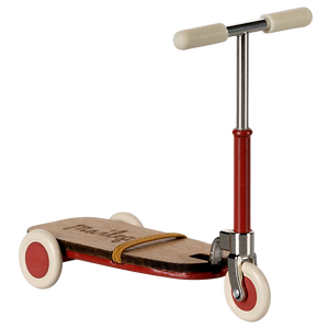 A red and beige Maileg kick board with metal handlebars and wooden details, designed for toy mice.