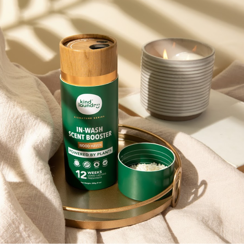 A bottle of Kind Laundry fragrance beads. 