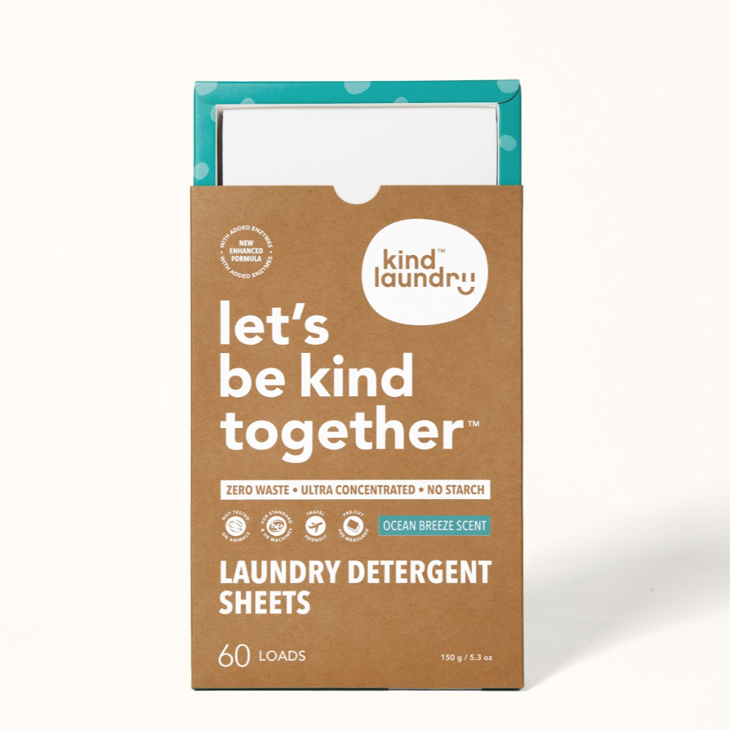 Packaging of Kind Laundry Detergent Sheets with 'Let's be kind together' text, indicating Ocean Breeze scent, and 60 loads capacity.