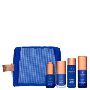 Set of skincare products with a blue pouch on a white background