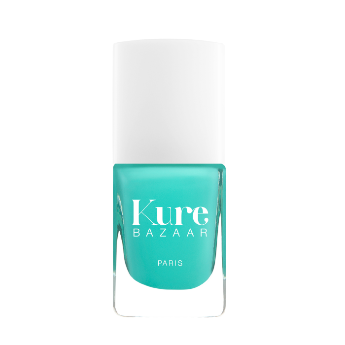 Turquoise nail polish bottle with white cap labeled 'Kure Bazaar' on a white background
