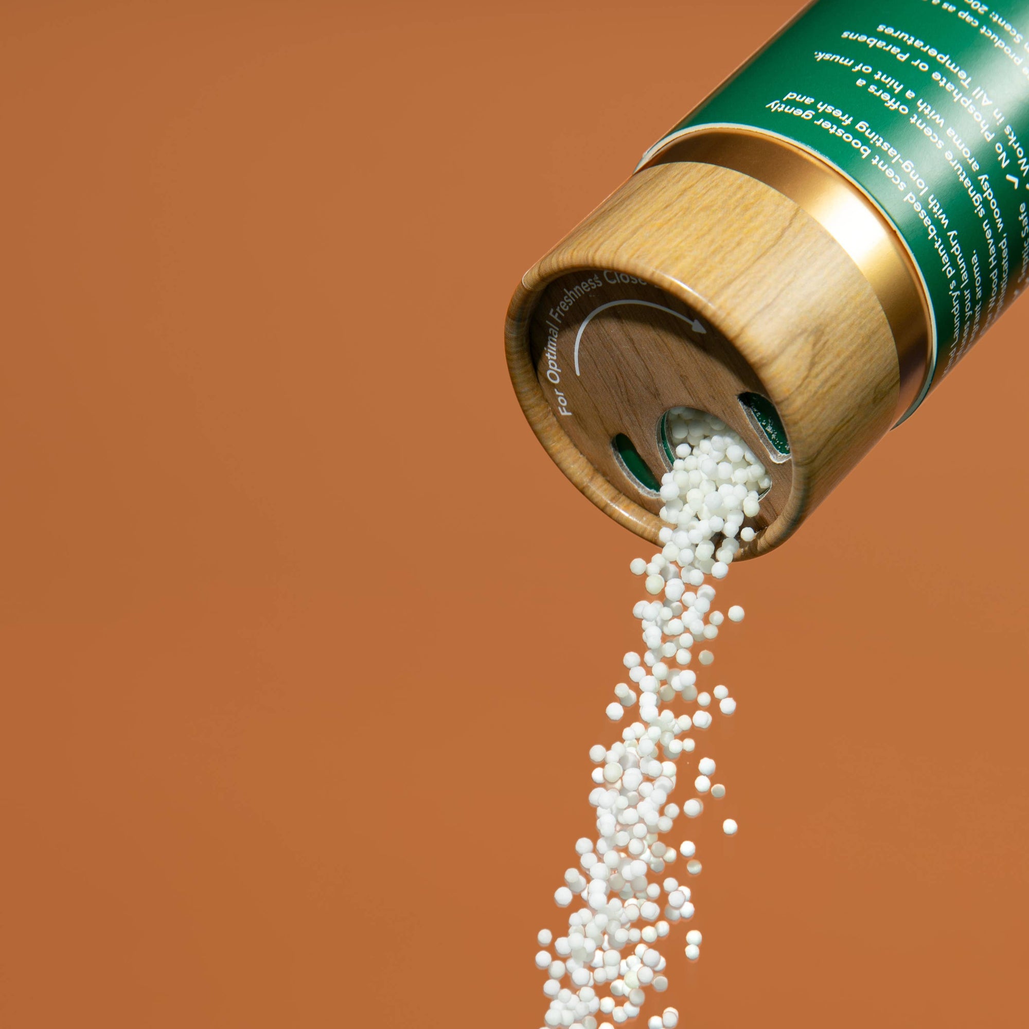 A bottle of Kind Laundry fragrance beads. 