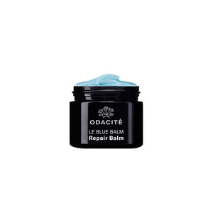 Black jar of Odacite Le Blue Balm Repair Balm on a white background
