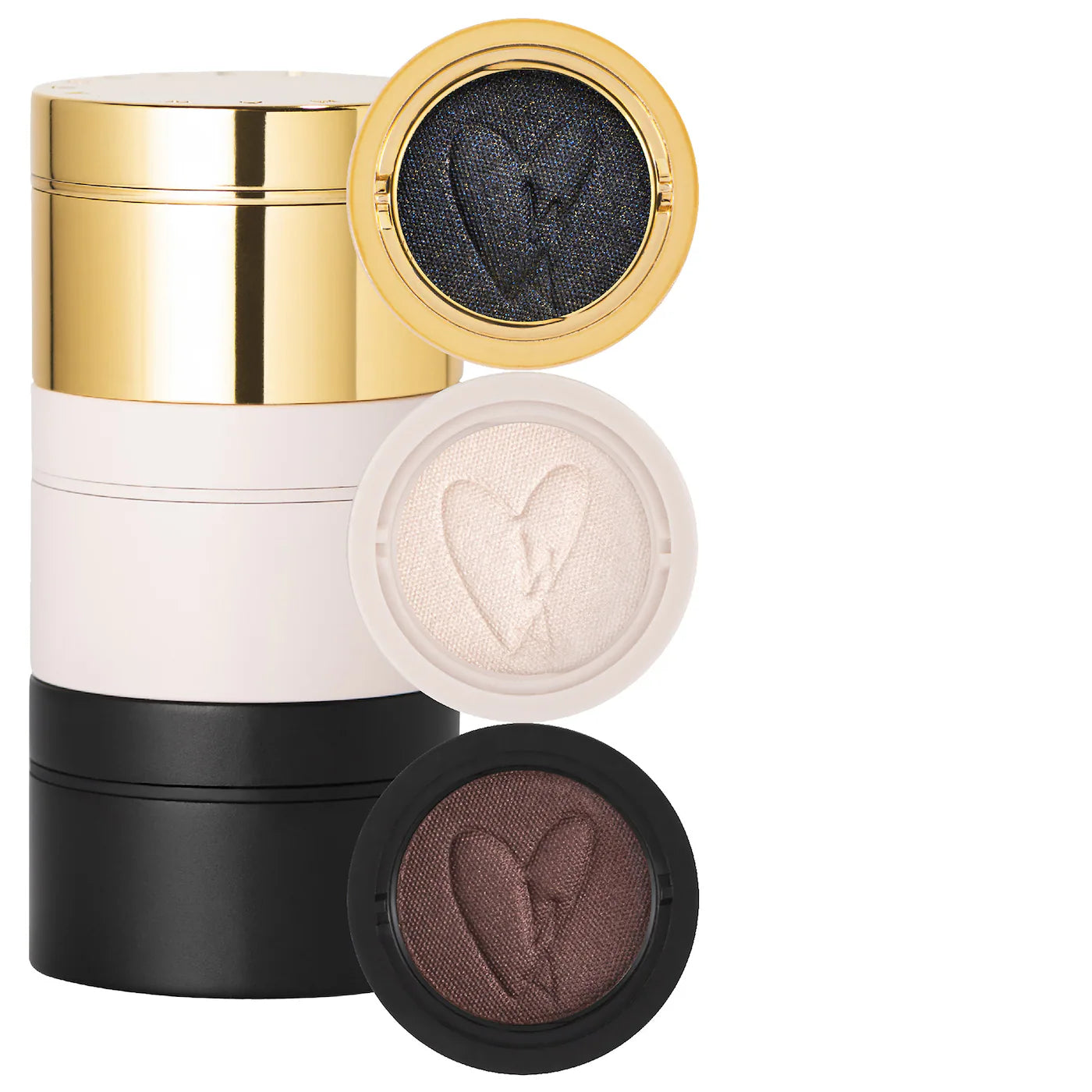 Three round eye shadow pods with a cream-to-powder consistency, displayed in natural shades with a golden, pink, and purple color scheme. Each pod has a unique texture with a logo at the center.