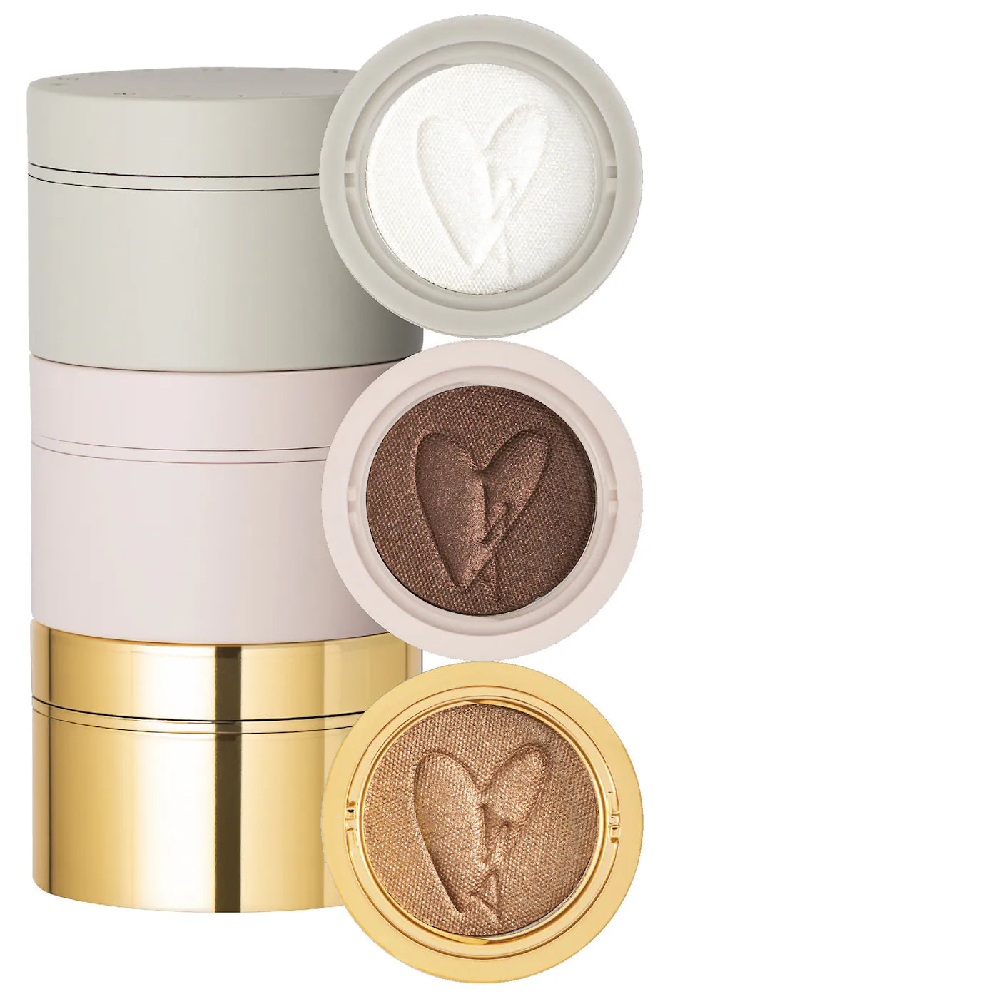 Three round eye shadow pods with a cream-to-powder consistency, displayed in natural shades with a golden, pink, and purple color scheme. Each pod has a unique texture with a logo at the center.