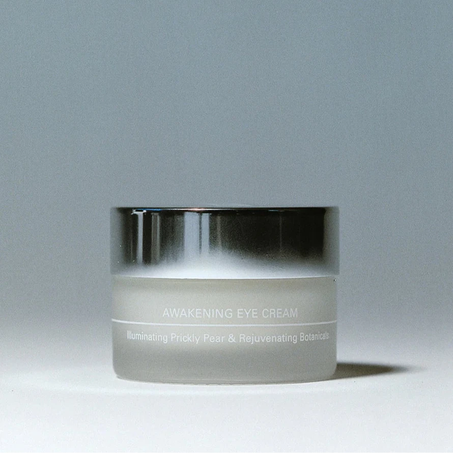 A container of Lesse Awakening Eye Cream