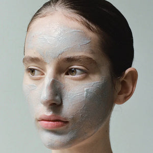 A woman with the bioactive mask applied to her face