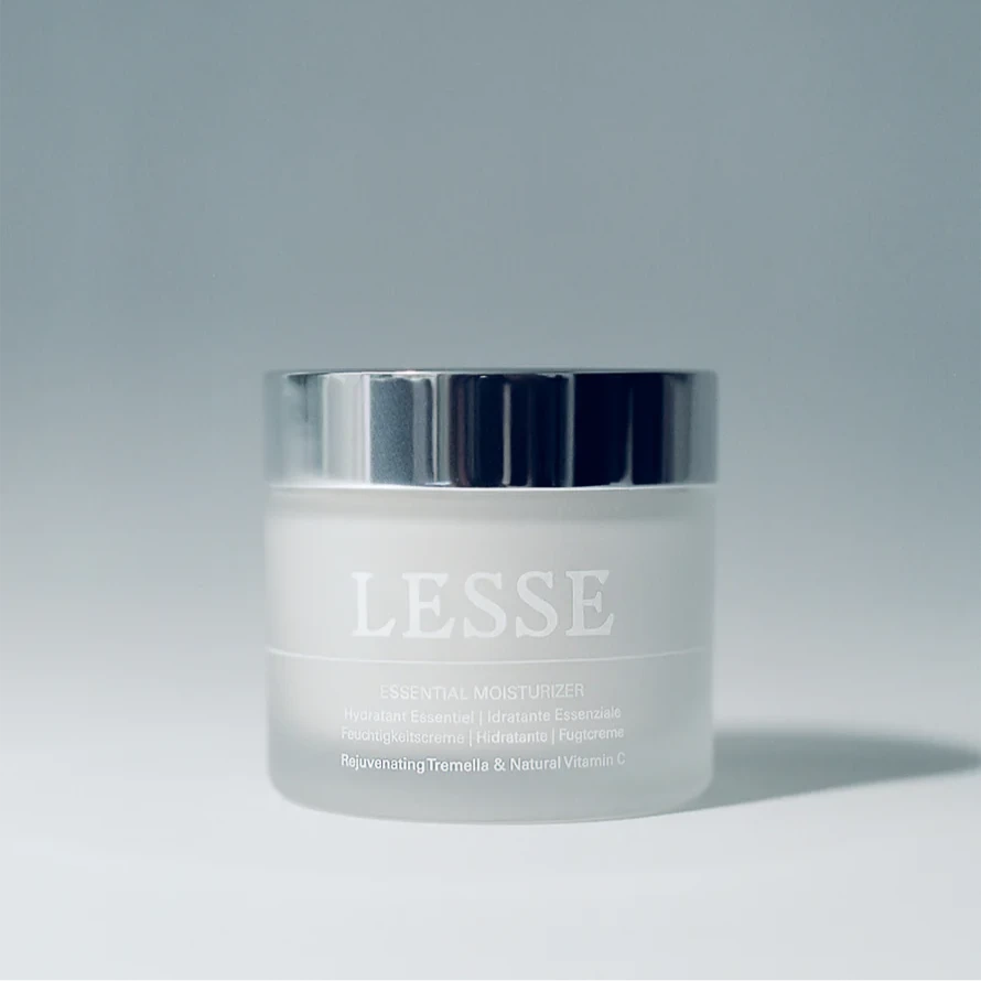 A bottle of Lesse essential moisturizer