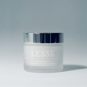 A bottle of Lesse essential moisturizer