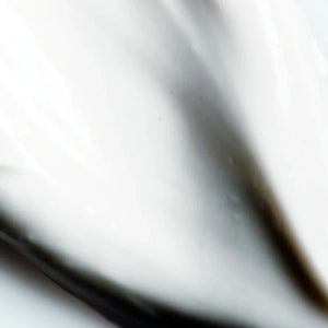 A close up of Lesse essential moisturizer