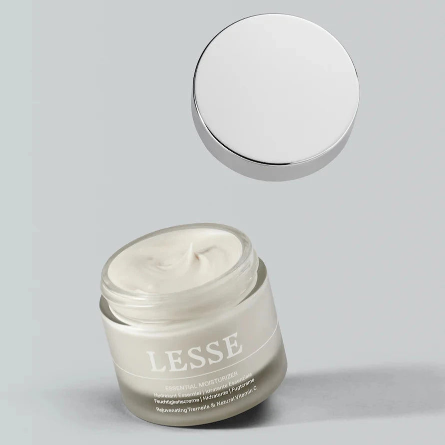 A bottle of Lesse essential moisturizer