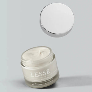 A bottle of Lesse essential moisturizer