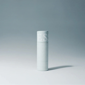 A tube of Lesse soothing lip balm, in a light grey tube with white writing