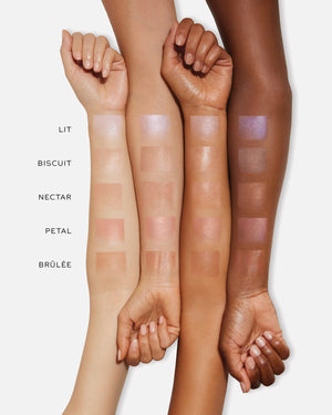 Color swatches on a person's arm with labeled shades against a white background